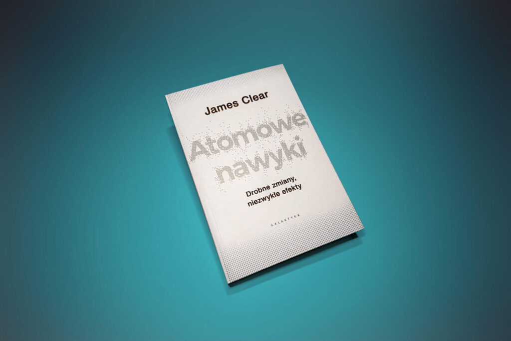 Okładka książki "Atomowe nawyki", której autorem jest James Clear